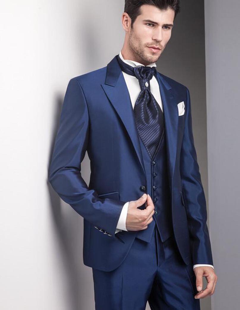You should go for blue, form-fitting grosgrain silk. It looks royal under artificial lights.