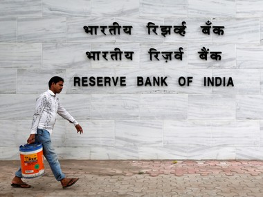 A man walks past the Reserve Bank of India (RBI) head office in Mumbai, India, June 7, 2016. REUTERS/Danish Siddiqui/File Photo - RTX2HW1V