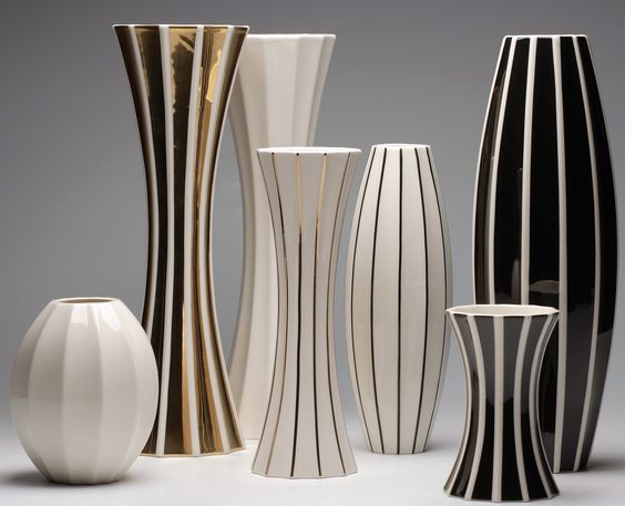 Designer paper mache/bone China vases.