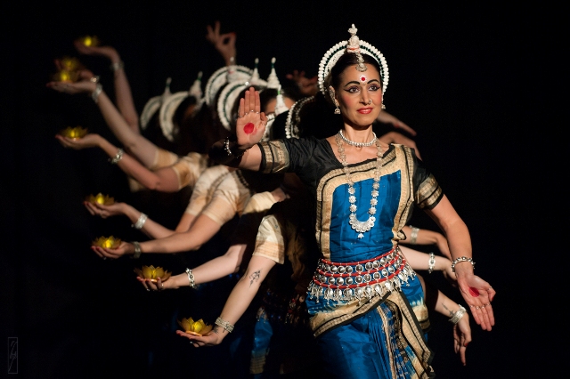Graceful dancers performing Odissi dance.