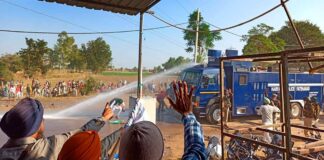 water cannons, police assaulting farmers