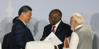 China President XI Jingping and Indian Prime Minister Narendra Modi at BRICS Summit 2023