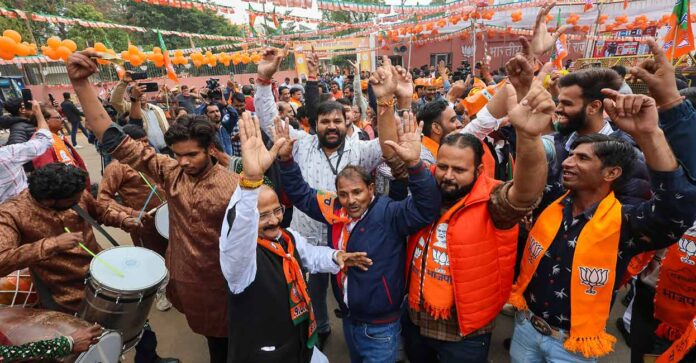 BJP workers and supporters outside the party headquarters during counting of votes for the Rajasthan Assembly elections, in Jaipur, Sunday, Dec. 3, 2023.